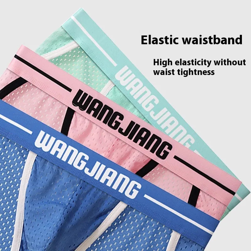Men's solid colour Ice Silk triangle briefs on a white background, showing the mesh fabric texture.
