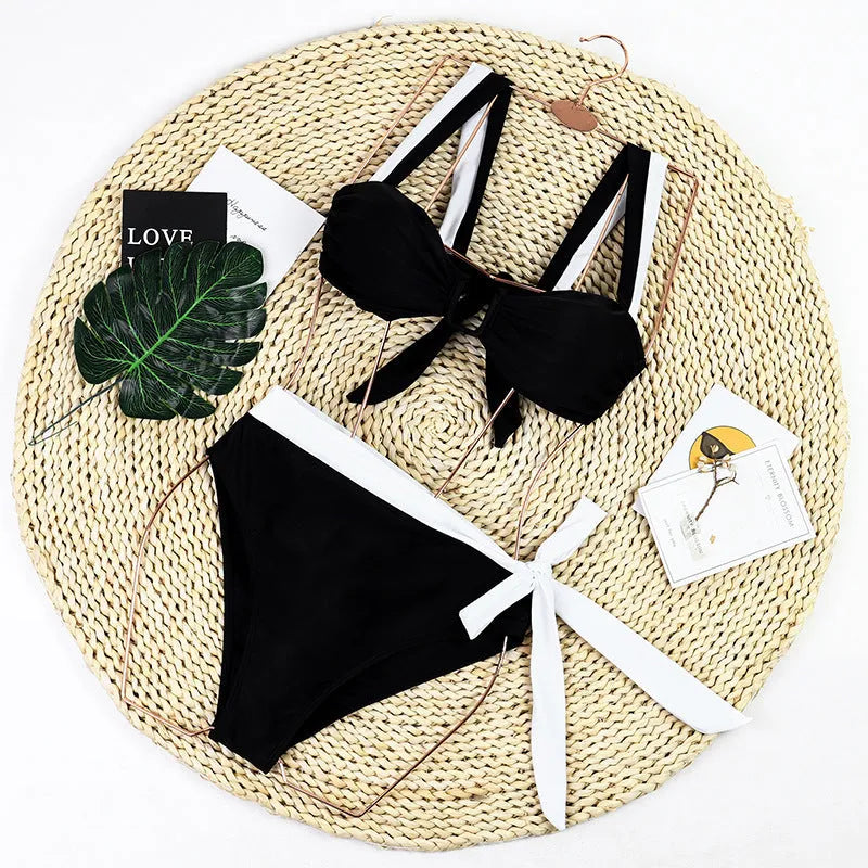 Black women's high-waist bikini swimsuit set with lined cups on a neutral background