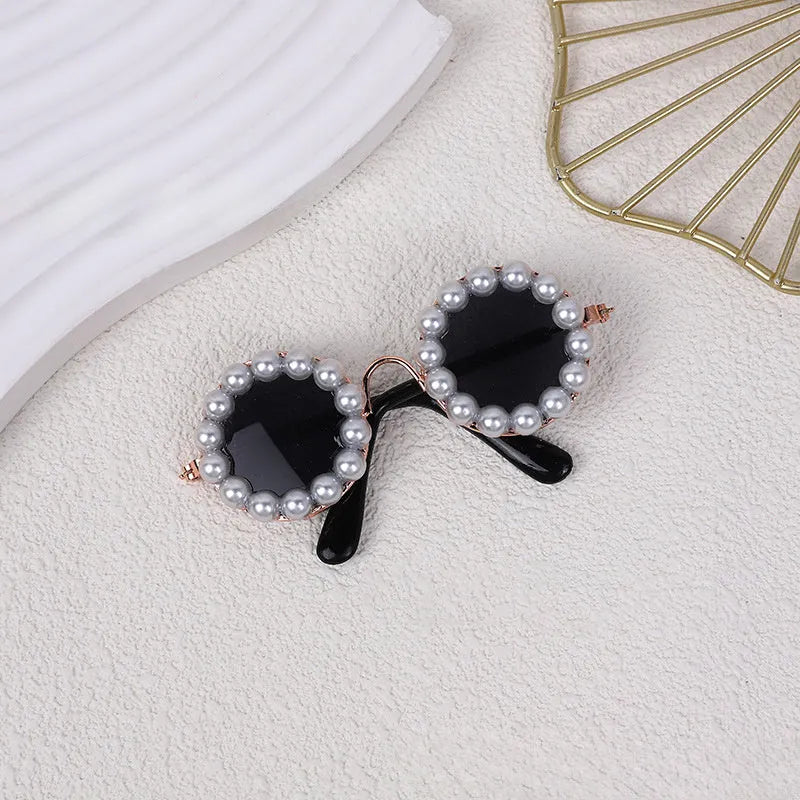 Pearl-trimmed round sunglasses for cats and dogs in five colour options