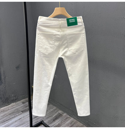 Men's white slim fit jeans with mid to low waist, micro elastic denim and small straight leg