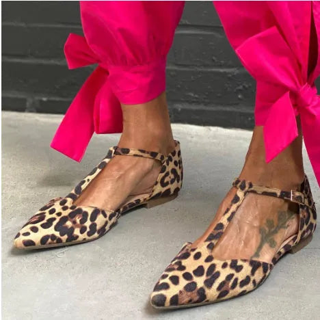 Women's pointed toe leopard print pumps with chunky low heel and low top height made from PU material featuring a simple style with cross shoulder straps suitable for summer spring autumn wear