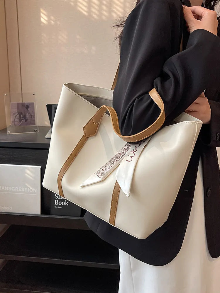 Women's large capacity casual tote crossbody shoulder bag in khaki colour with outer pocket and zip compartment.