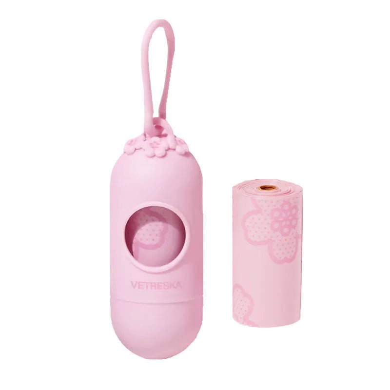 Dog poo bag dispenser capsule with roll of scented waste bags in strawberry, orange, or cherry blossom options