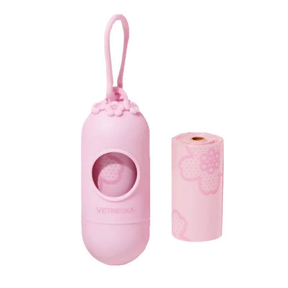 Dog poo bag dispenser capsule with roll of scented waste bags in strawberry, orange, or cherry blossom options