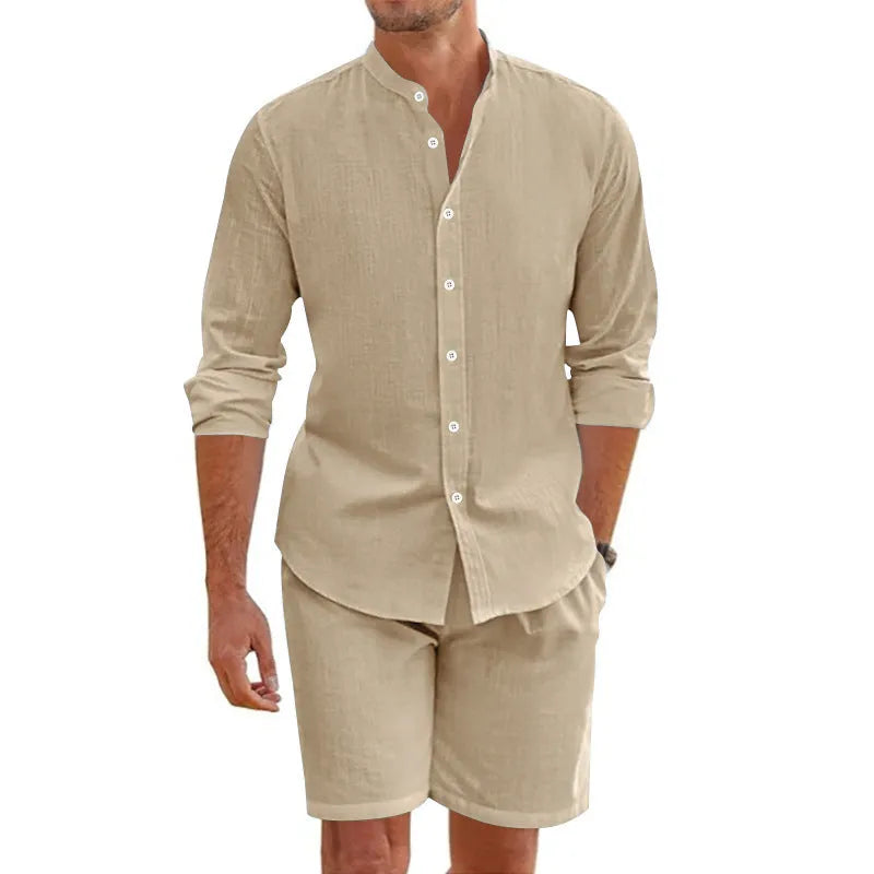 Man wearing a light blue short sleeve lapel shirt and matching drawstring shorts from a summer shirt suit.