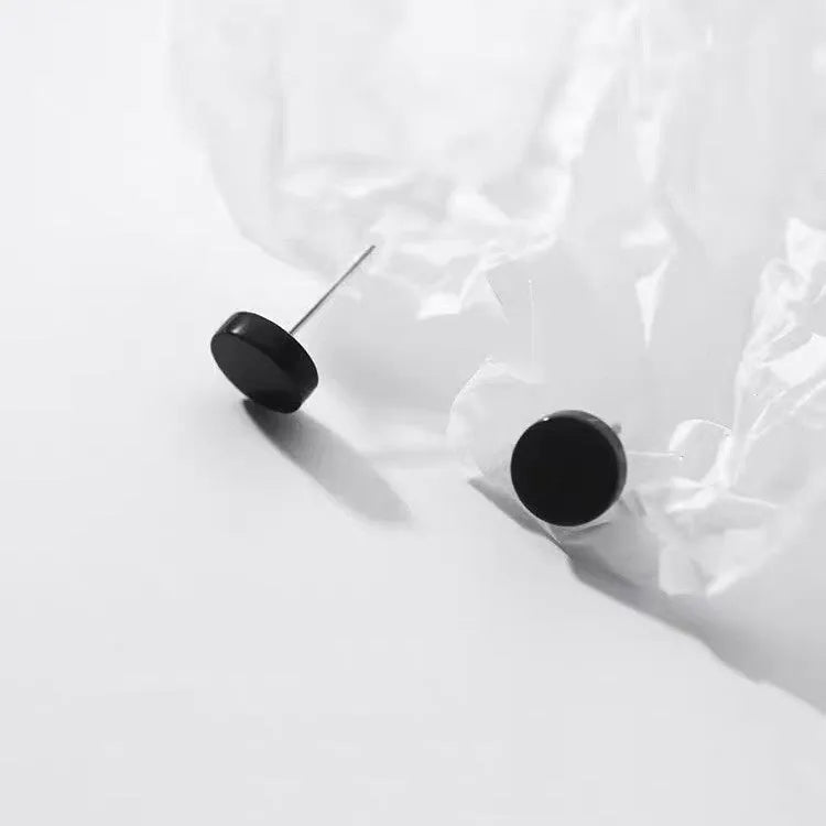 S999 sterling silver round flat bone stud earrings in silver or black, showing size range from 3mm to 8mm.