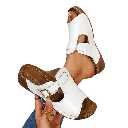 Women's white roman-style slip-on slippers with a fish-mouth toe opening on a light background.