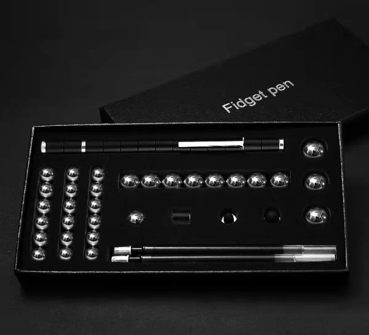 Modular magnetic pen with erasable ink, stress-relieving fidget features, and interchangeable components