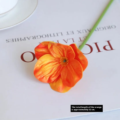 Pack of 15 mini artificial poppy flowers in assorted colours including purple, pink, yellow and red.