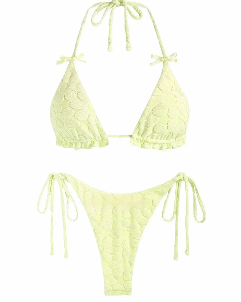 Women's light blue strappy backless bikini swimsuit on a mannequin