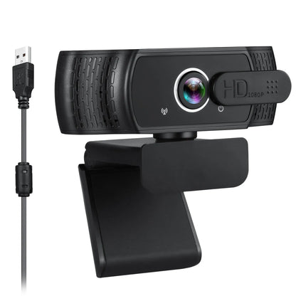 Black USB webcam with microphone on a laptop screen, showing 360-degree rotation and universal clip.