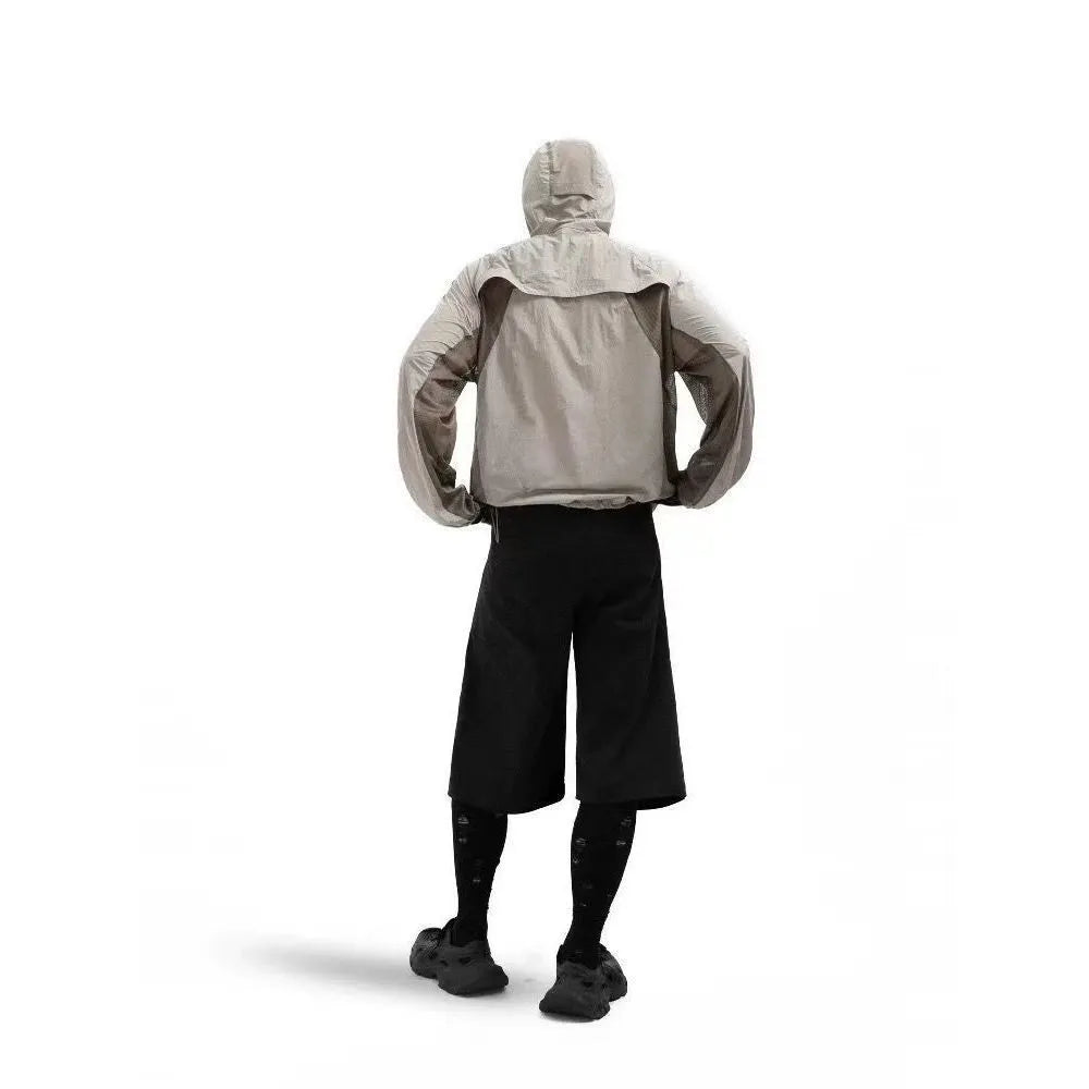 Mesh stitching sun protective clothes in desert brown colour, lightweight nylon fabric.