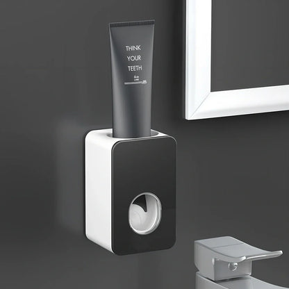 Black wall-mounted automatic toothpaste dispenser with 1 ml pump, punch-free adhesive, 18 cm height for bathroom use