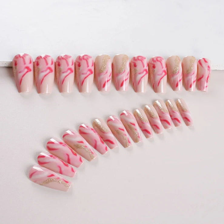 One Second Wearable Manicure set with 24 nail art pieces in rose, tulip, leopard print, and XINGX patterns