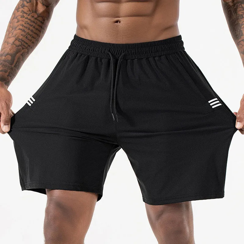 Men's Ice Silk quick-drying shorts in nylon high elasticity fabric, breathable cropped length high waist trousers for sports and casual wear, available in black and green.