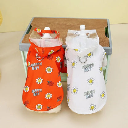 Transparent dog raincoat with small flower pattern and pull ring traction system