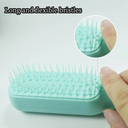 Dual-sided small dog grooming brush showing pin brush and soft bristle brush sides, in blue colour.