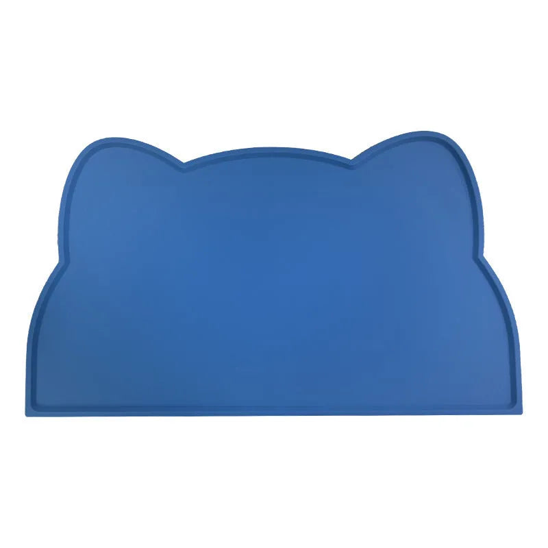 Solid-colour silicone pet feeding mat with cat head design measuring 44 by 24 centimetres