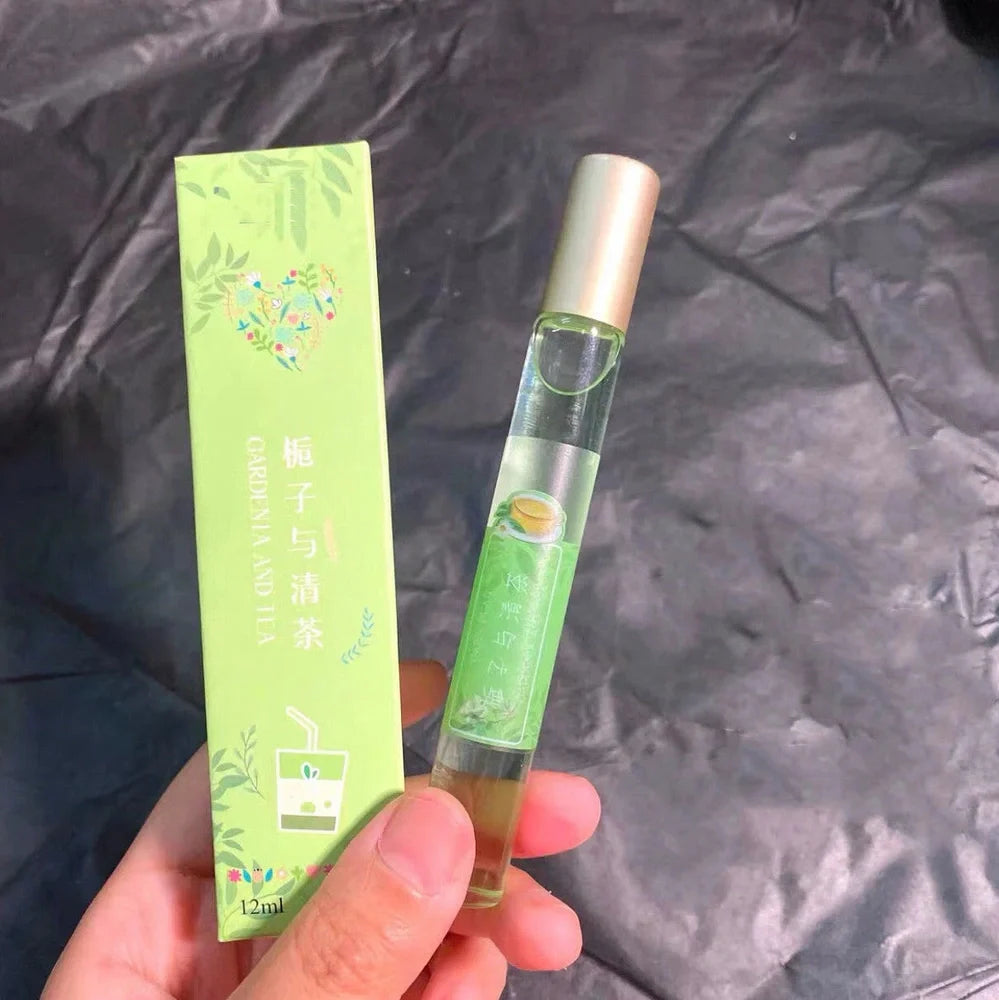 12ml glass rollerball essential oil fragrance bottle with Pure Gardenia label, featuring metal applicator for subtle scent application
