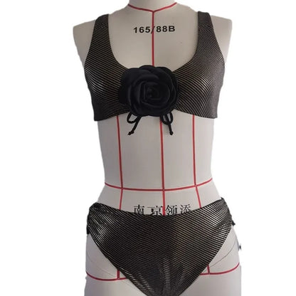Black women's triangle swimsuit set with 3D stereo beach styling on hanger