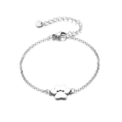 Stainless steel bracelet with a polished dog paw design, a stylish accessory for pet lovers