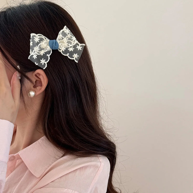 Women's hair bow barrettes crafted from cloth material in beige lace, blue bow, oval, pearl butterfly and ribbon styles, with pastoral design elements for female hair accessories, sold individually