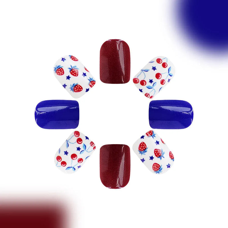 Press on nail stickers with short glossy red and blue strawberry cherry design, 24 pieces per pack, suitable for Independence Day or patriotic theme manicures, offering sweet hot girl fresh European American ins style wearable artificial nails for ladies.