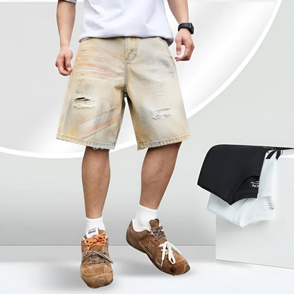 Men's light blue denim shorts with distressed finish and straight-leg silhouette