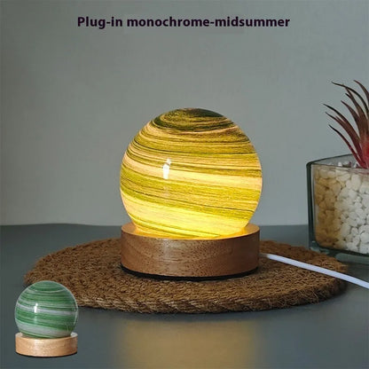 Planet night light with USB cable and base, showing 80mm model and three-colour dimming options