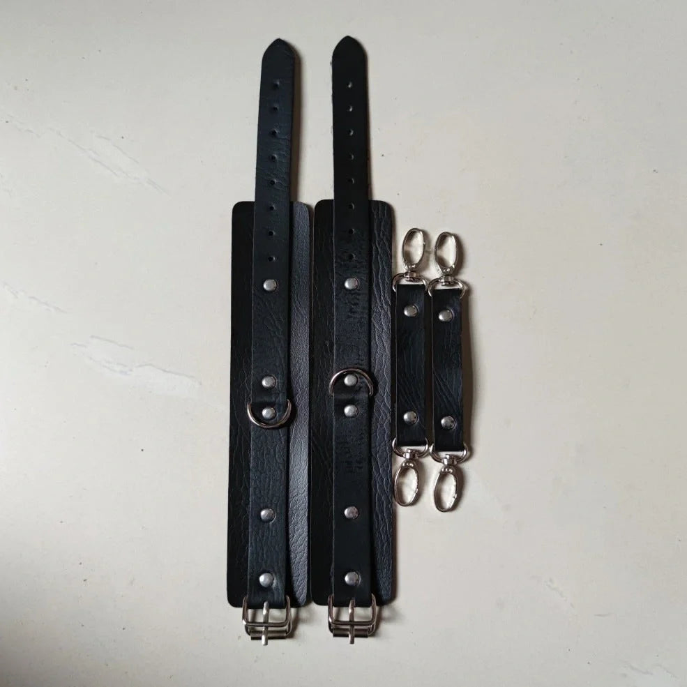 Black PU leather BDSM bondage harness set with adjustable straps and four restraint components