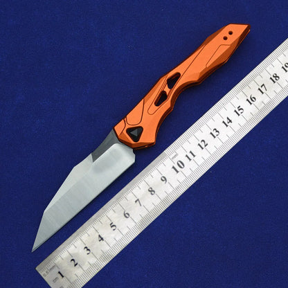 Black folding fruit knife with D2 steel blade and aluminium handle, shown open with length scale.