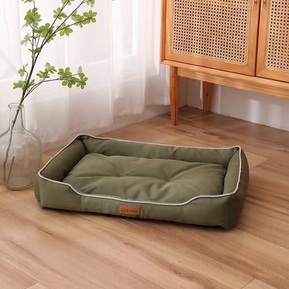 Waterproof dog sofa bed in grey Oxford cloth showing raised sides and rectangular shape