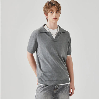Knitted short-sleeved polo collar casual T-shirt in a solid colour on a hanger.