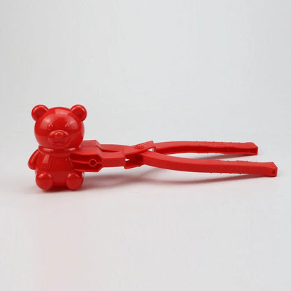 Red heart-shaped snowball maker clip for kids, perfect for winter play