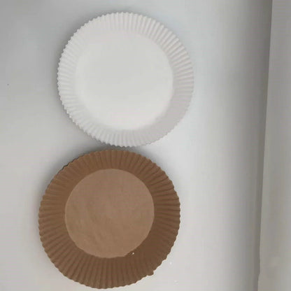 Disposable air fryer liners made from high-quality parchment paper, designed to keep your air fryer clean and your meals healthy