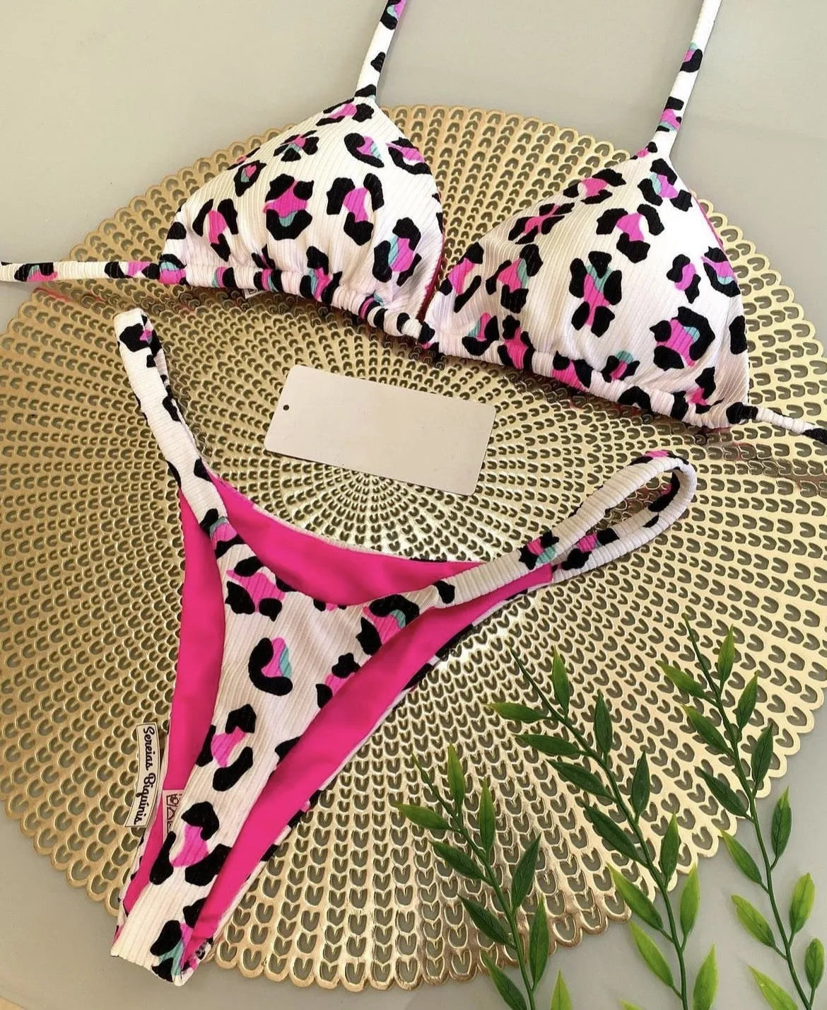 Women's printed two-piece bikini swimsuit with quick-dry fabric and cotton lining.