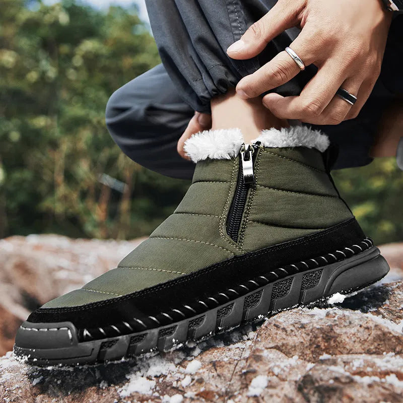 Men's plus size snow boot in black with round toe, flat heel, and rubber sole.