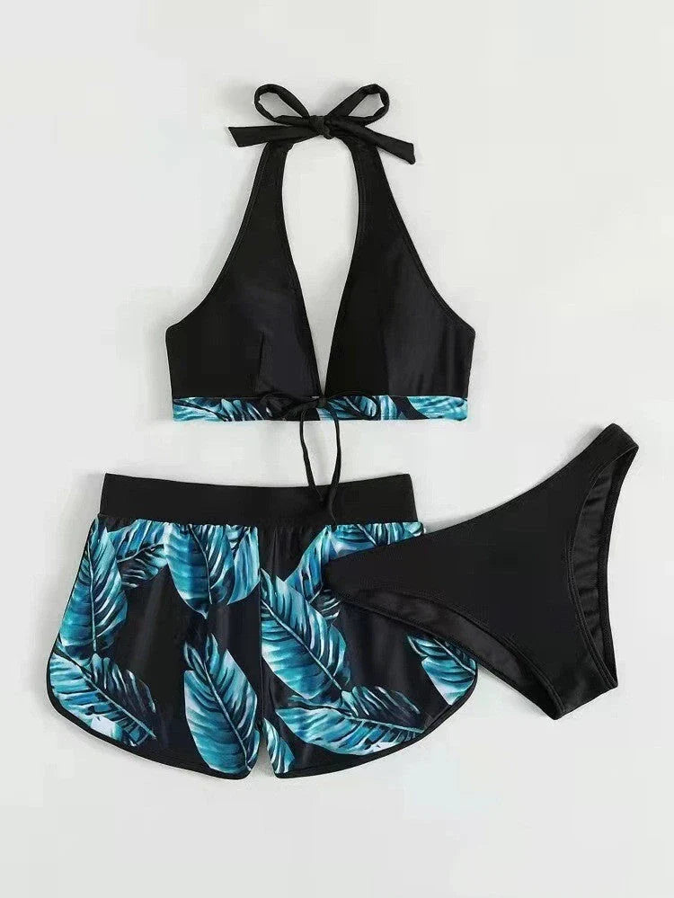 A stylish 3-piece leaf print bikini set with matching shorts, available in a variety of vibrant colors and patterns