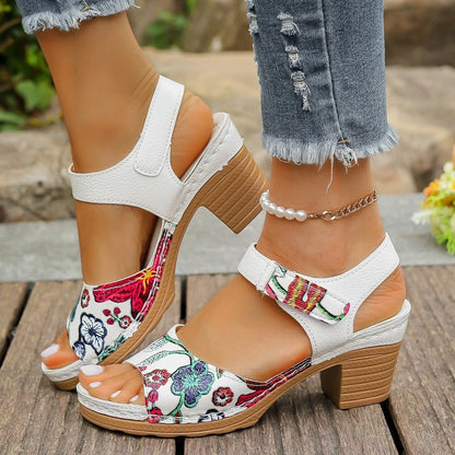 White women's high heel sandals with velcro buckle closure and rubber sole
