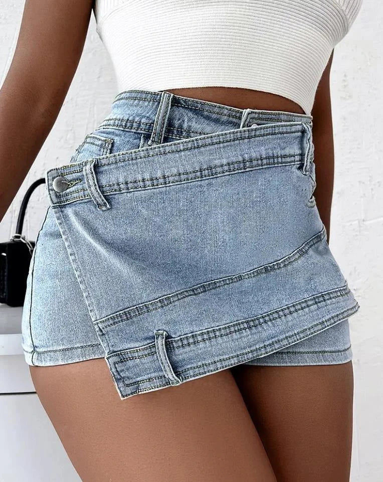 Stylish Y2K denim shorts with asymmetrical hem, available in dark blue, light blue, grey, and black colors in sizes S-5XL