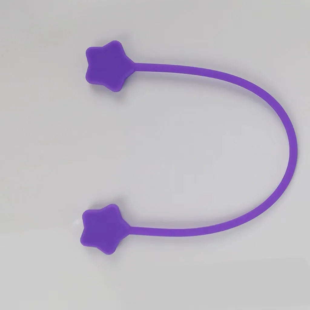 Silicone magnet wire winder for cable organisation in assorted colours on a white background.