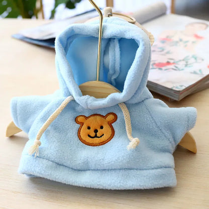 Cloth dog hoodie sweater in blue, shown in medium 23cm size on a small dog.
