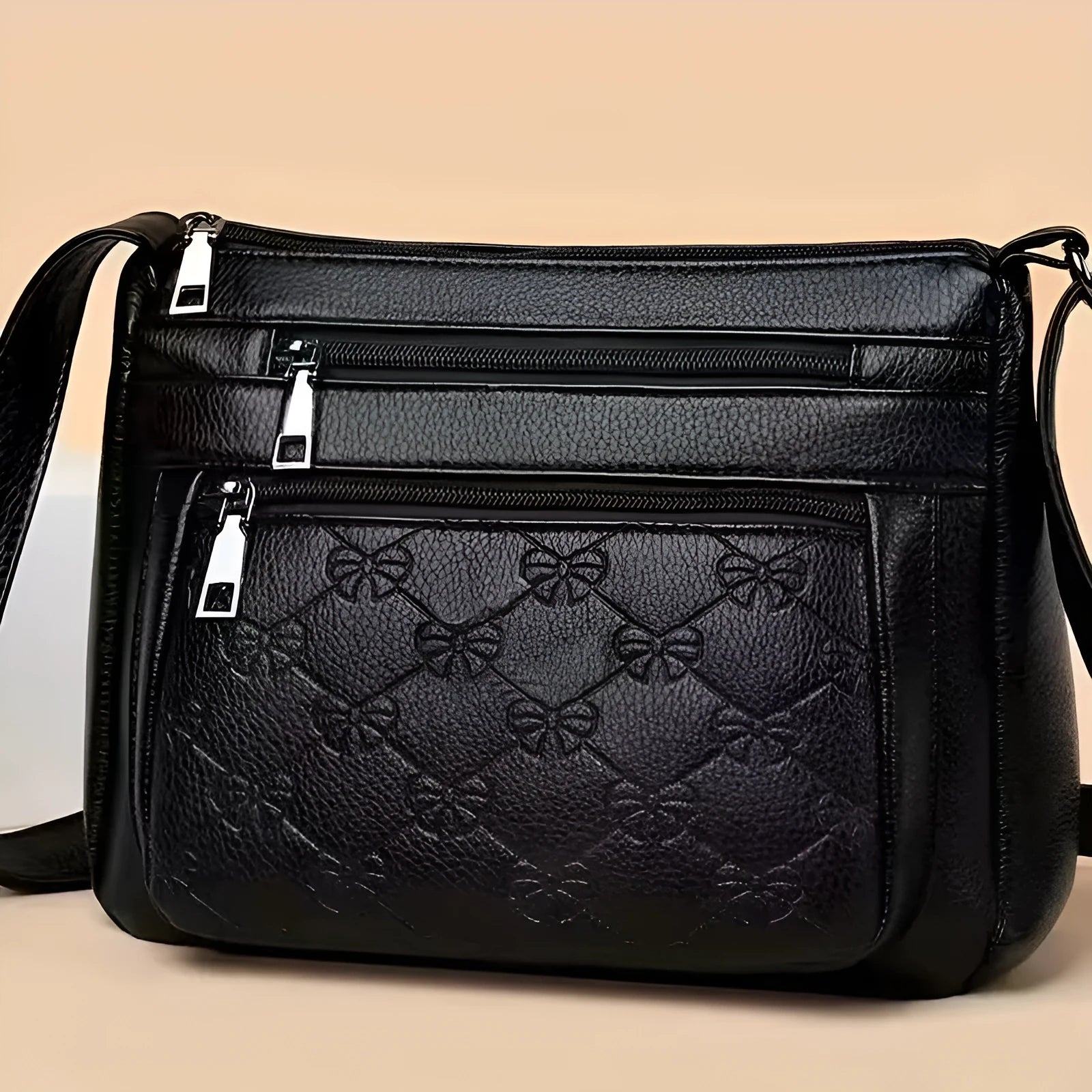 Butterfly black women's crossbody bag with horizontal square shape, slit pocket, and embossed PU detail