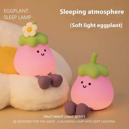 Cartoon eggplant-shaped night light with soft yellow glow measuring 100mm diameter