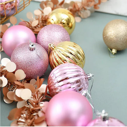 Assortment of 34 round 4cm plastic Christmas baubles in gold, silver, red, blue, and other colours.