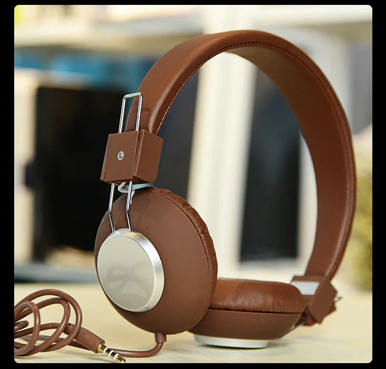 Wired over-ear sports headphones with a microphone, shown in multiple colour options on a white background.