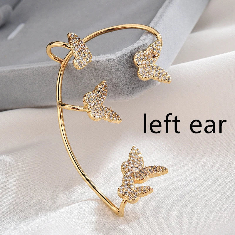 Elegant gold-plated butterfly ear cuffs with sparkling zircon accents, perfect for women's fashion and accessorizing