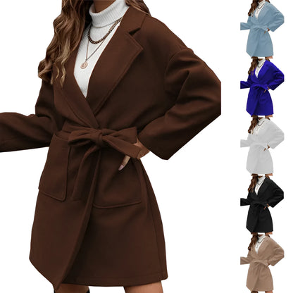 Brown loose fit minimalist coat with lapel buttons and integrated belt, showing regular sleeves and split design