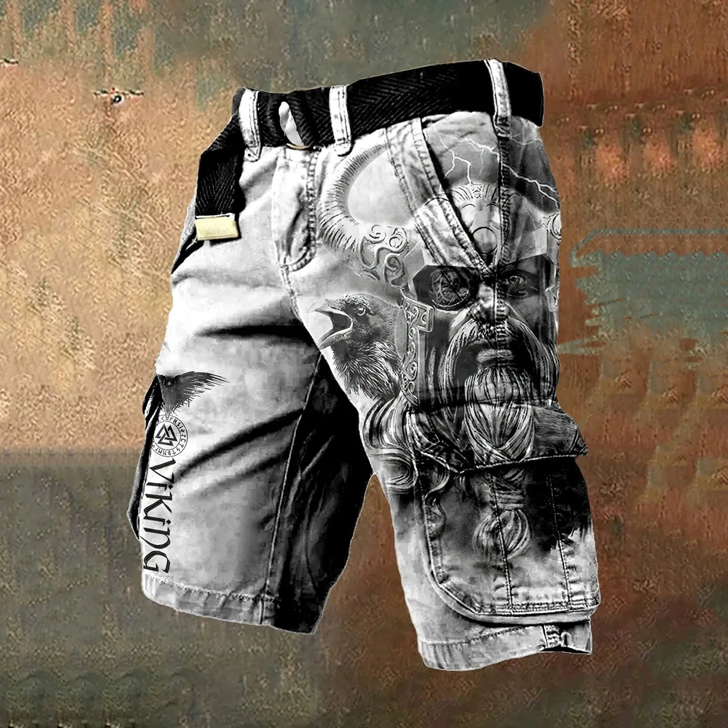 Man wearing grey 3D digitally printed polyester shorts with a zip fastening.