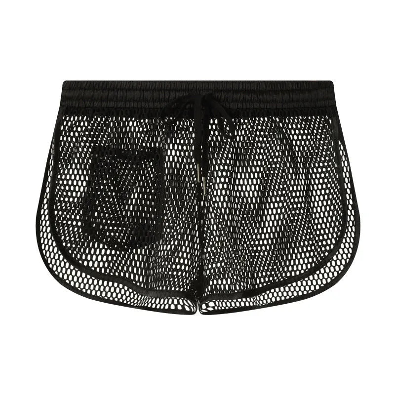 Men's solid colour loose fit polyester boxer shorts shown in black, white, grey, and red.